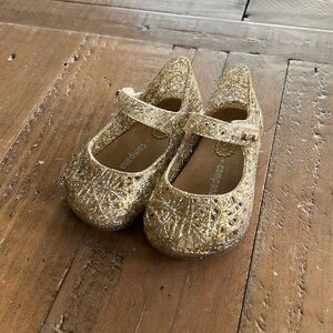 Mini Melissa gold campana shoes